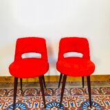 Pair of chairs red rug