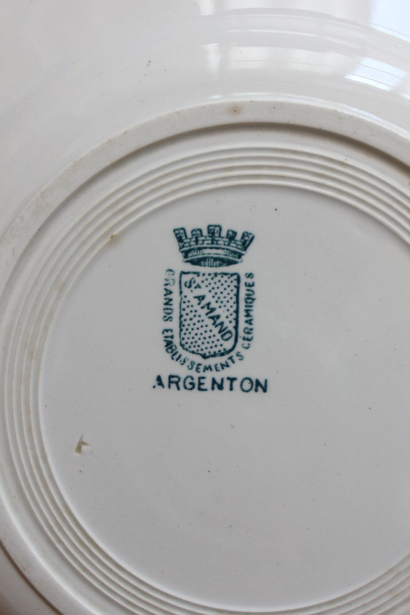 11 flat plates in iron earth "Argenton" Saint Amand early twentieth century