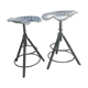 Two tractor-style industrial stools