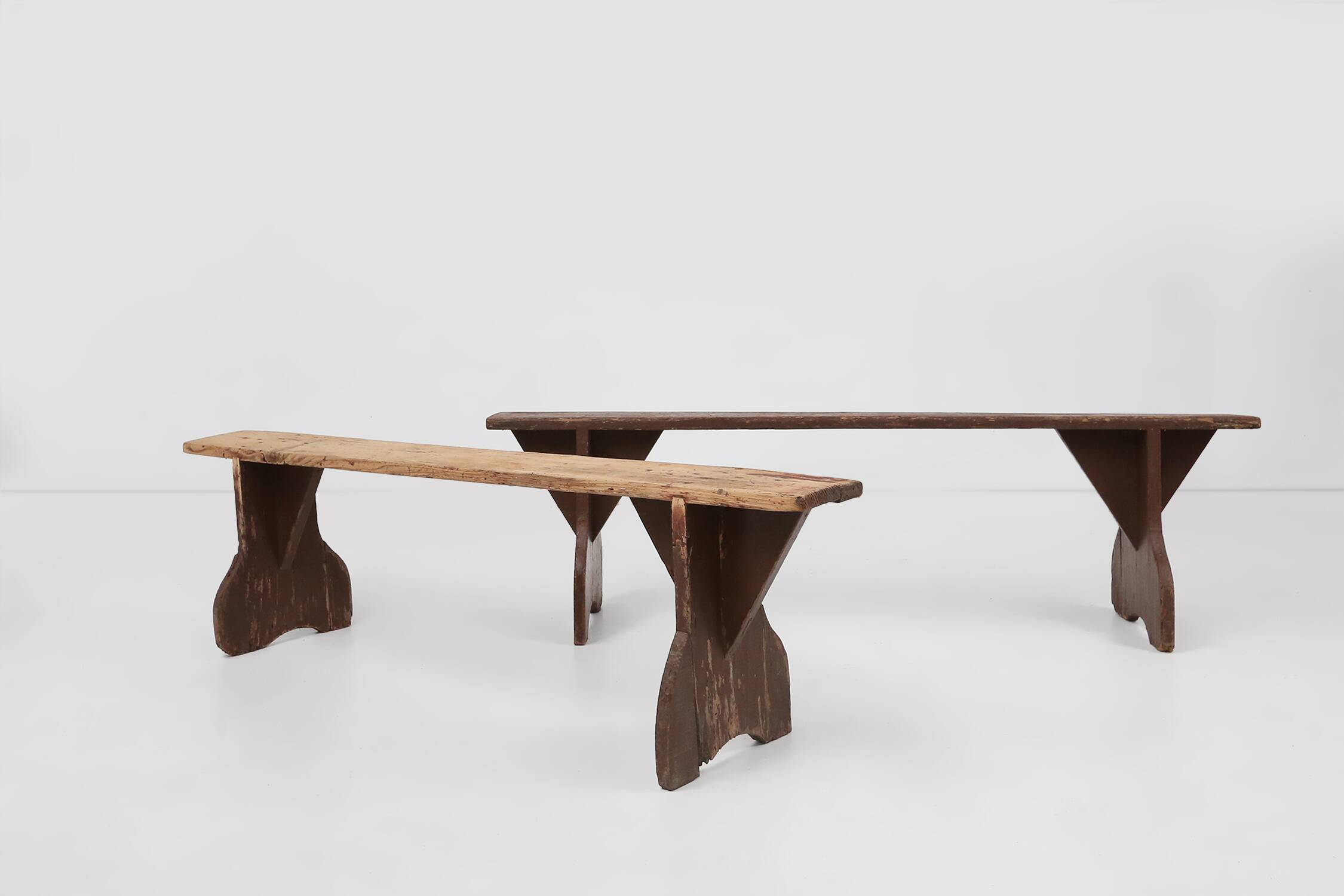 Rustic wooden bench in with brown painted feet, France ca. 1890