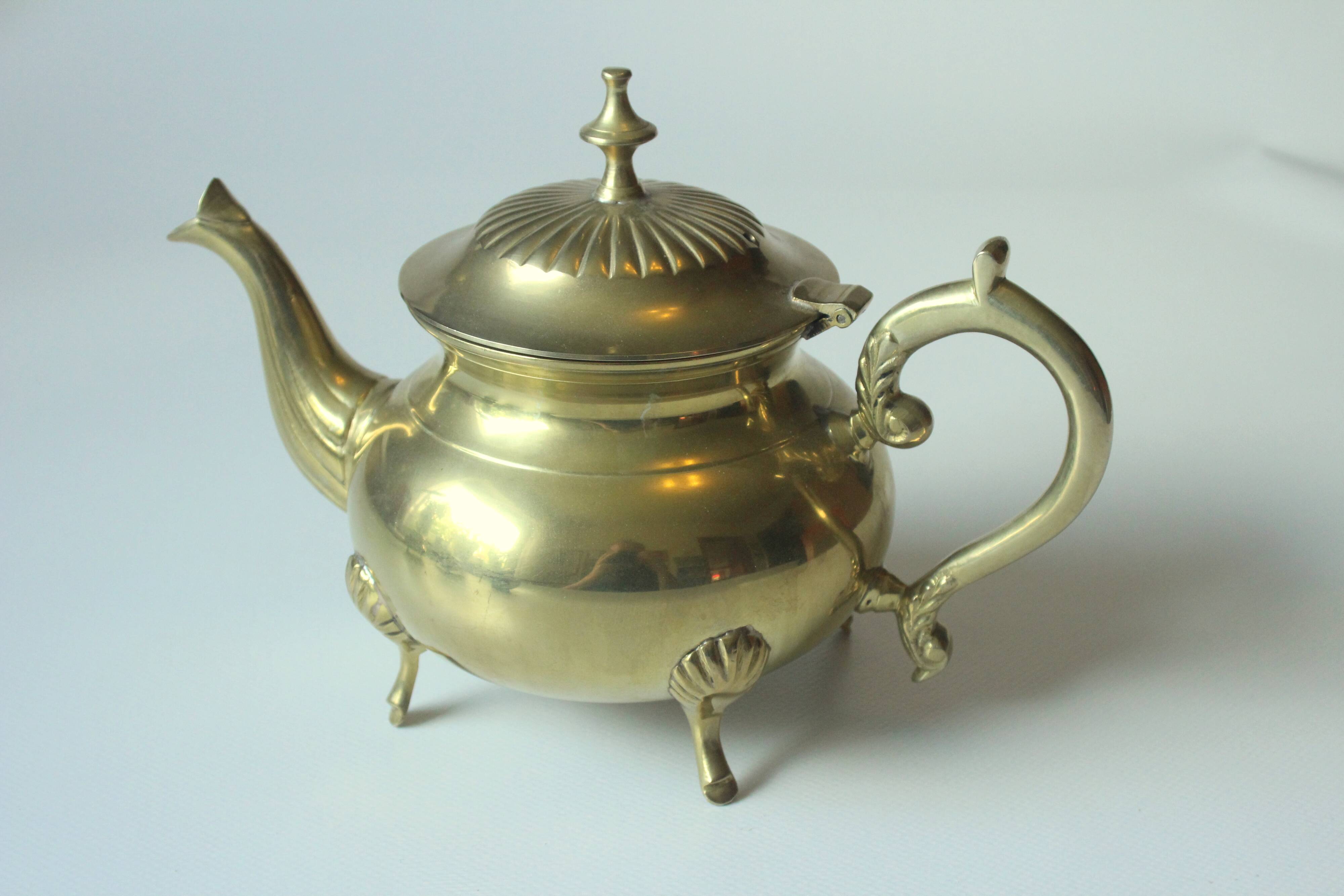 Metal teapot gold plated, inside silver plated, with milk pot and sugar bowl as a set, vintage
