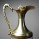 Vintage decorative jug in moulded glass and gilded brass, Italy circa 1980.