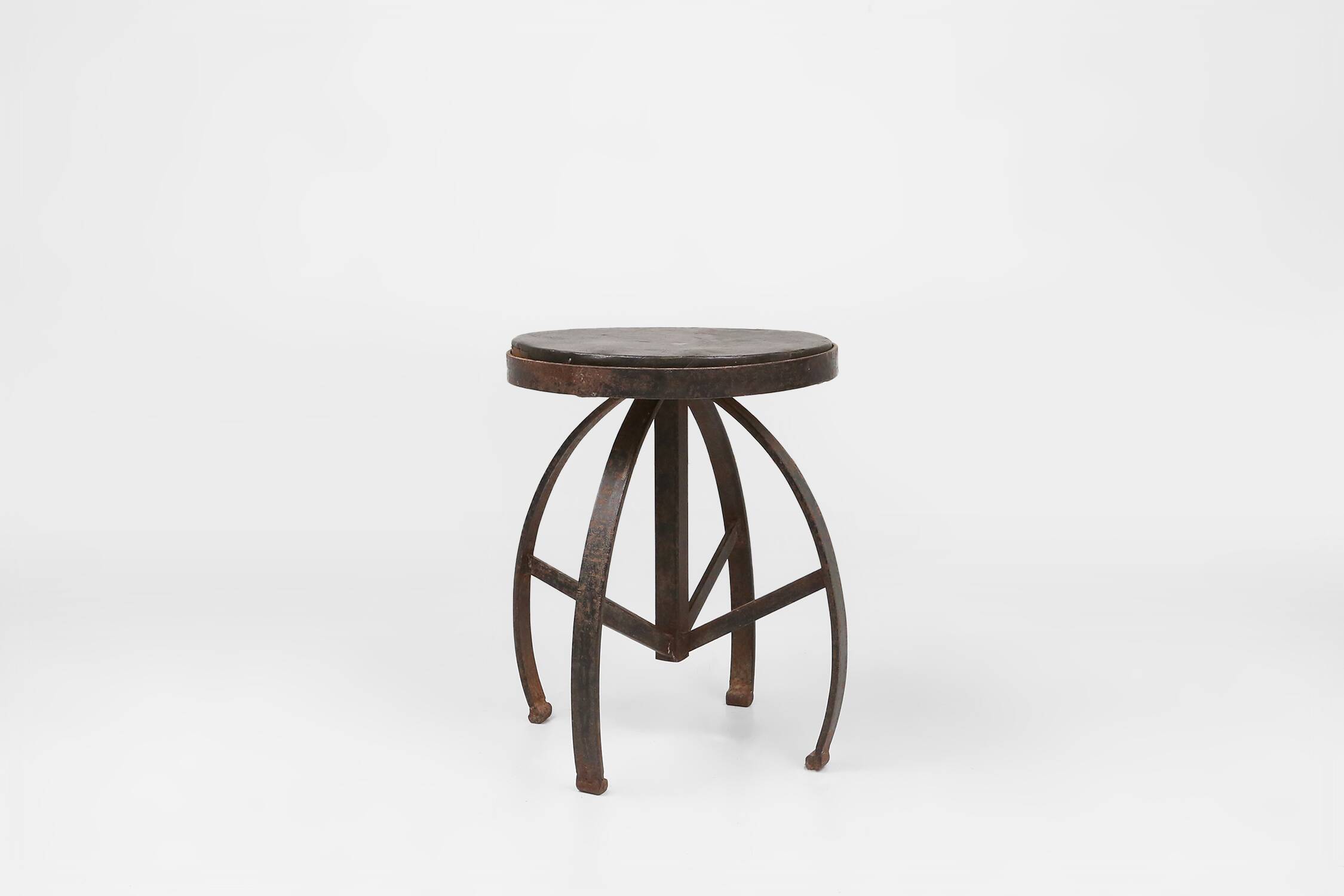Industrial black metal stool with unique frame, France ca. 1920