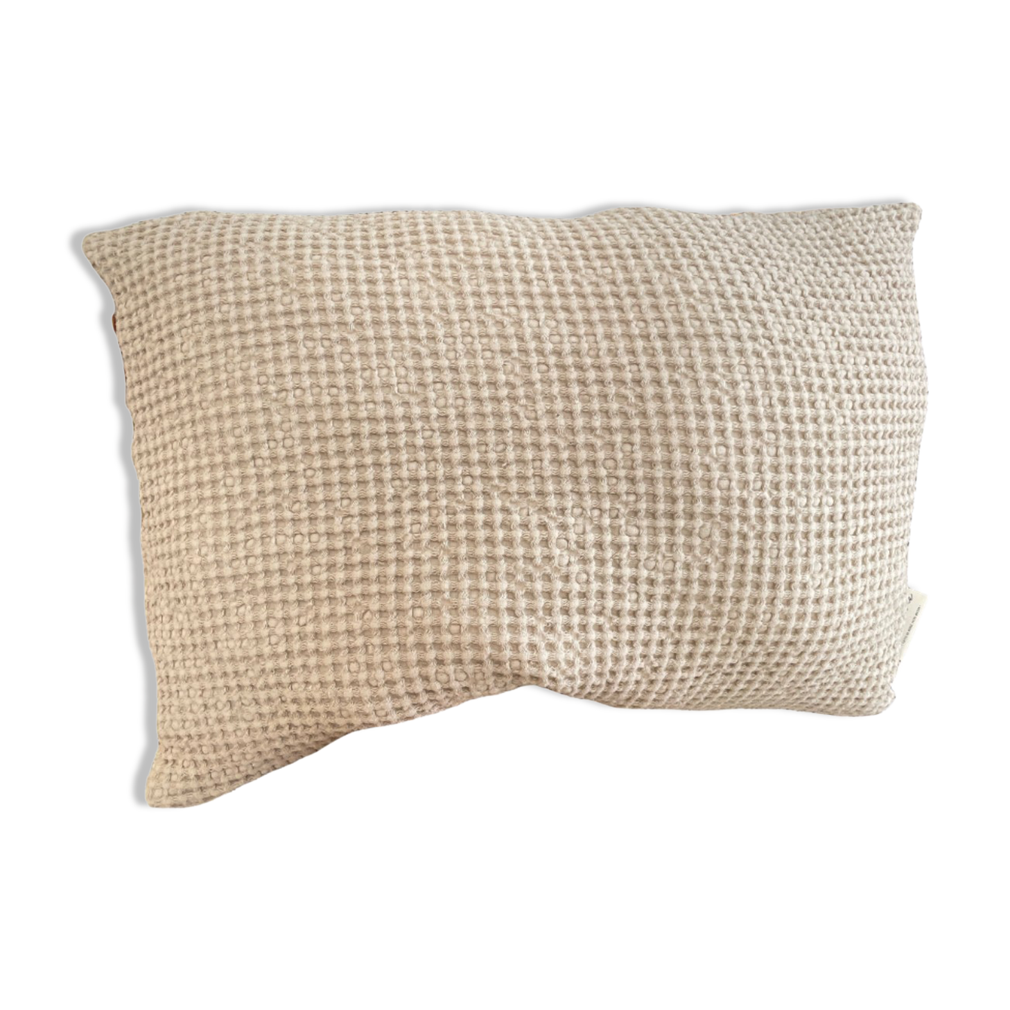 Light beige embossed cushion