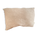 Light beige embossed cushion