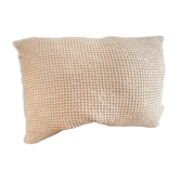 Light beige embossed cushion