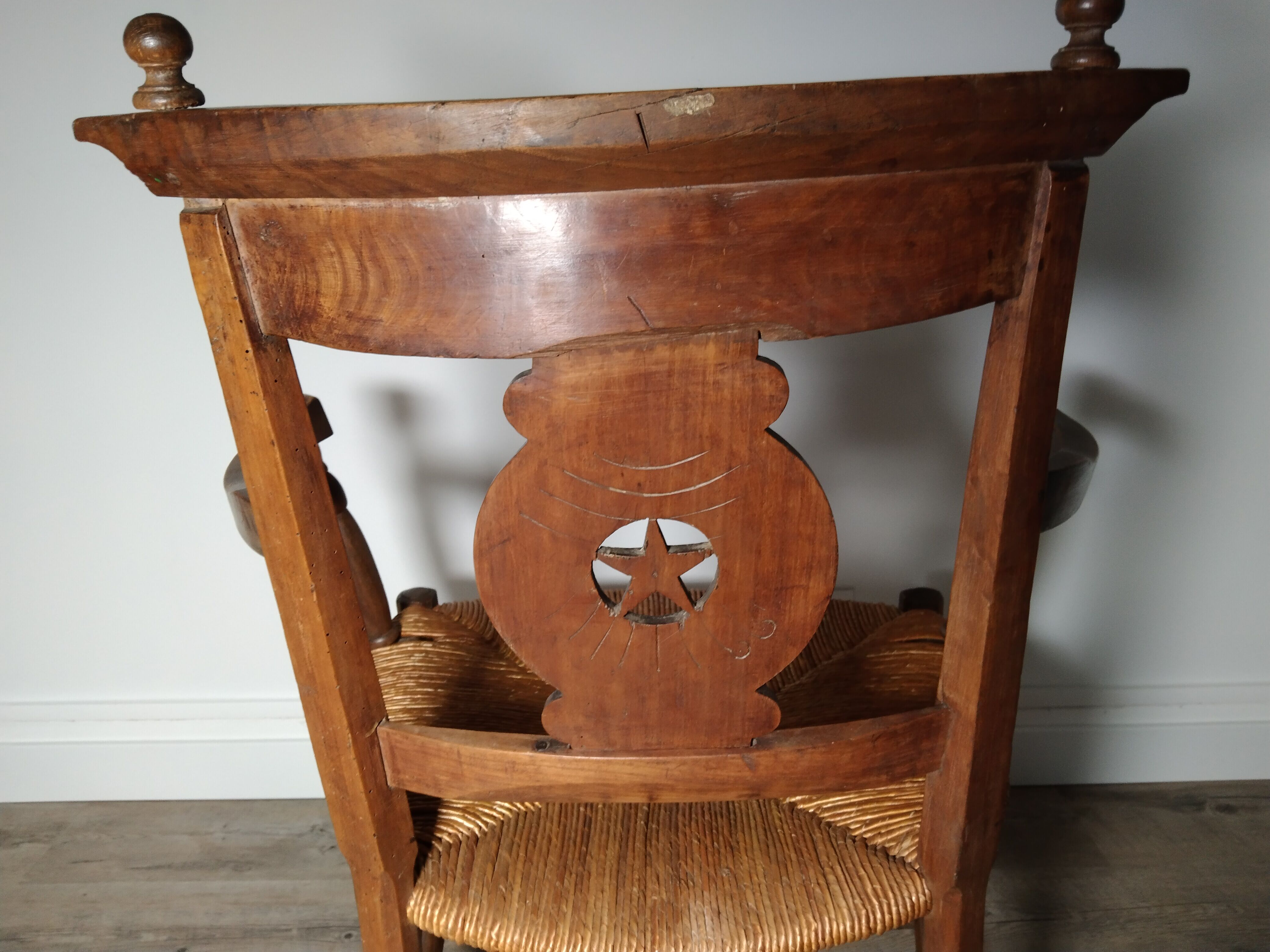 Straw armchair folk art.
