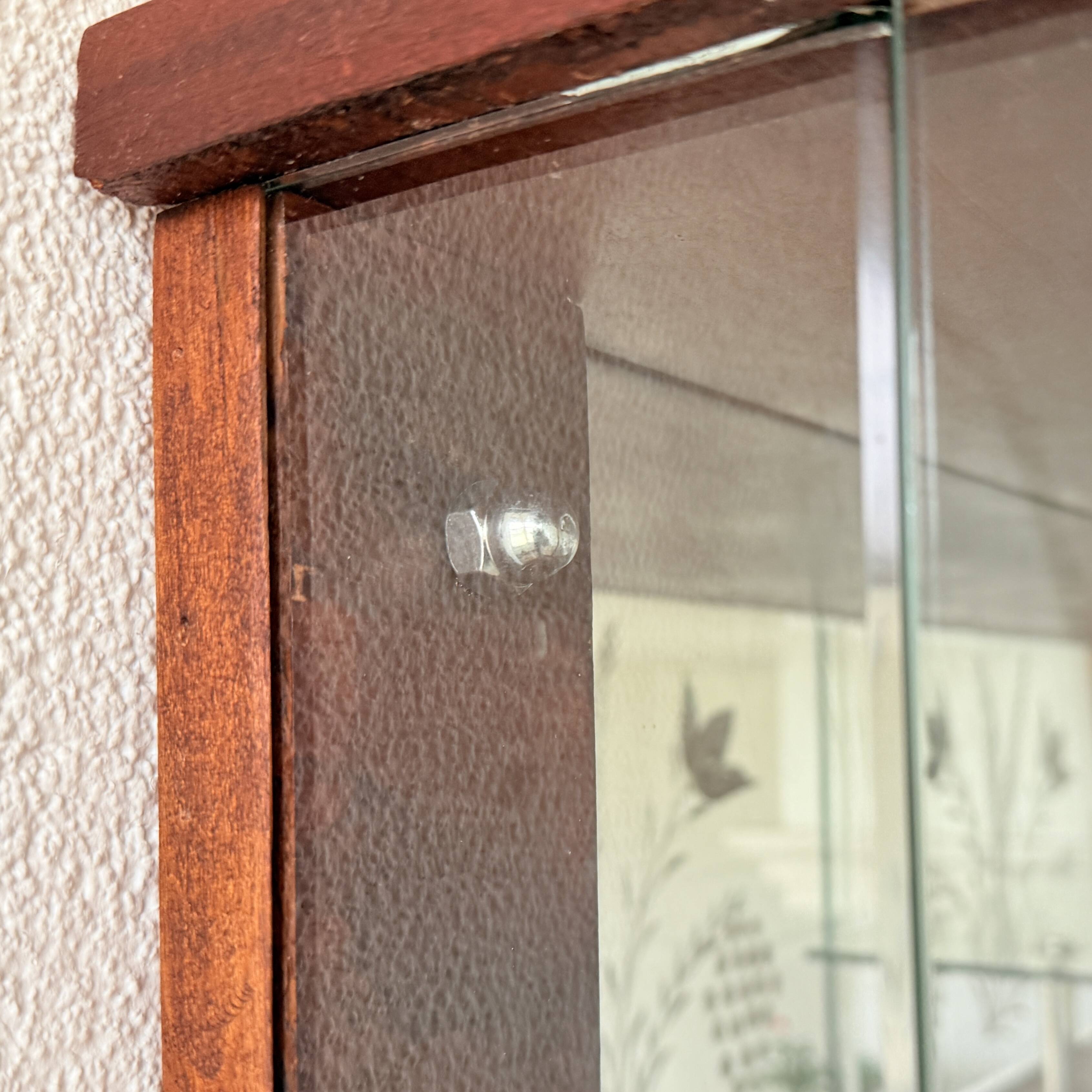 Hanging display cabinet in Art Deco style