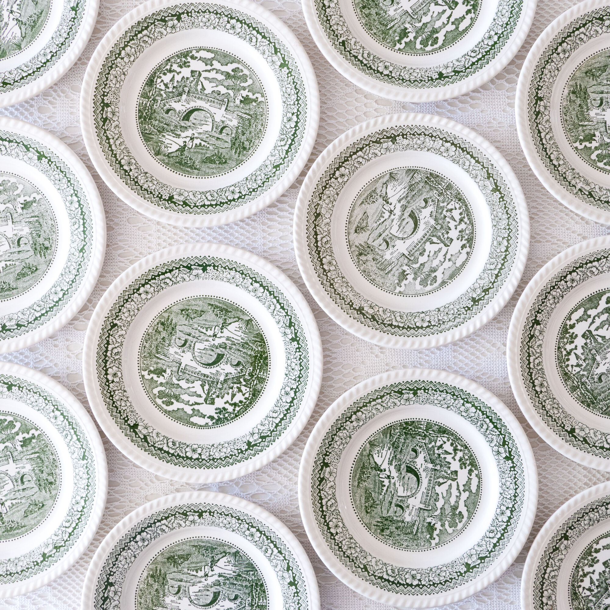 Service of vintage green plates in country English earthenware