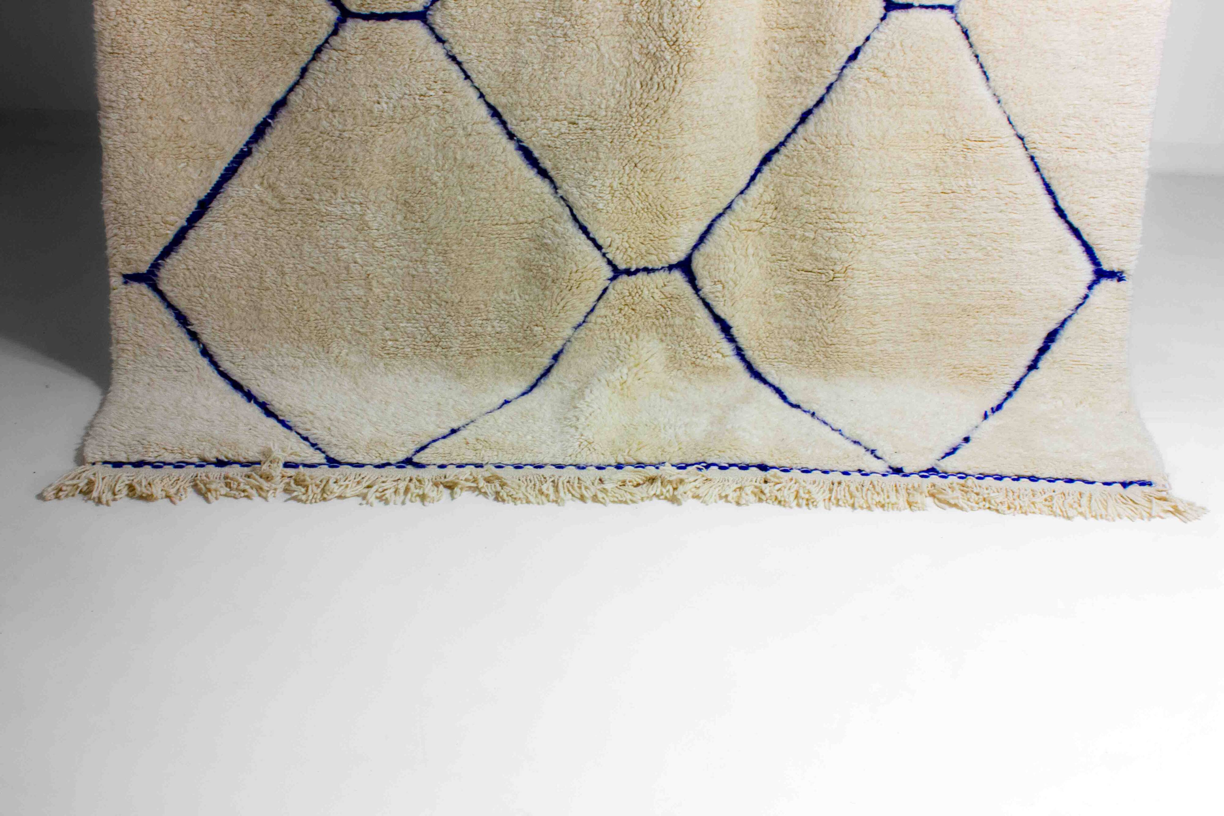 Vintage berber rug in ivory and blue wool
