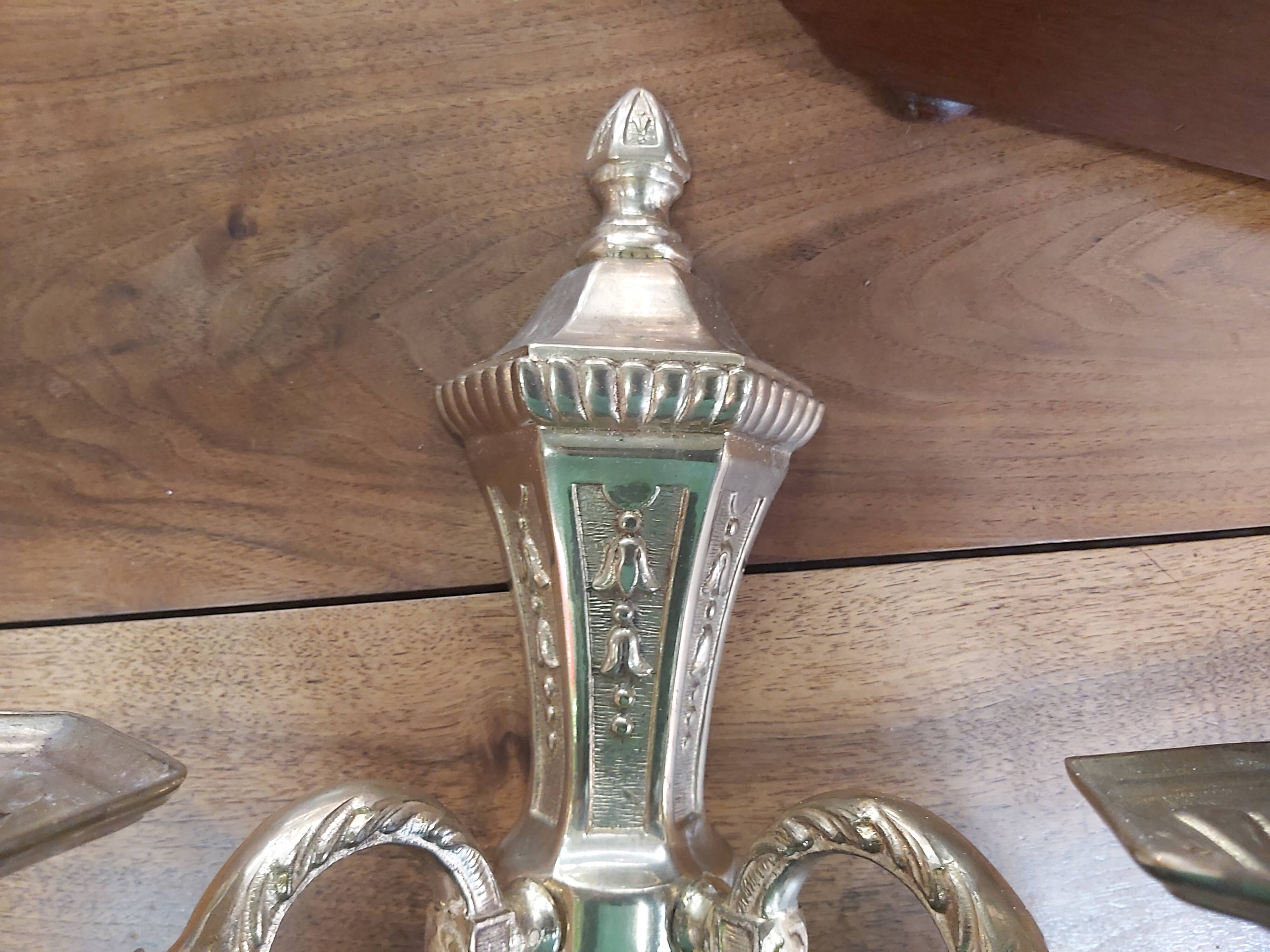 Pair of bronze sconces