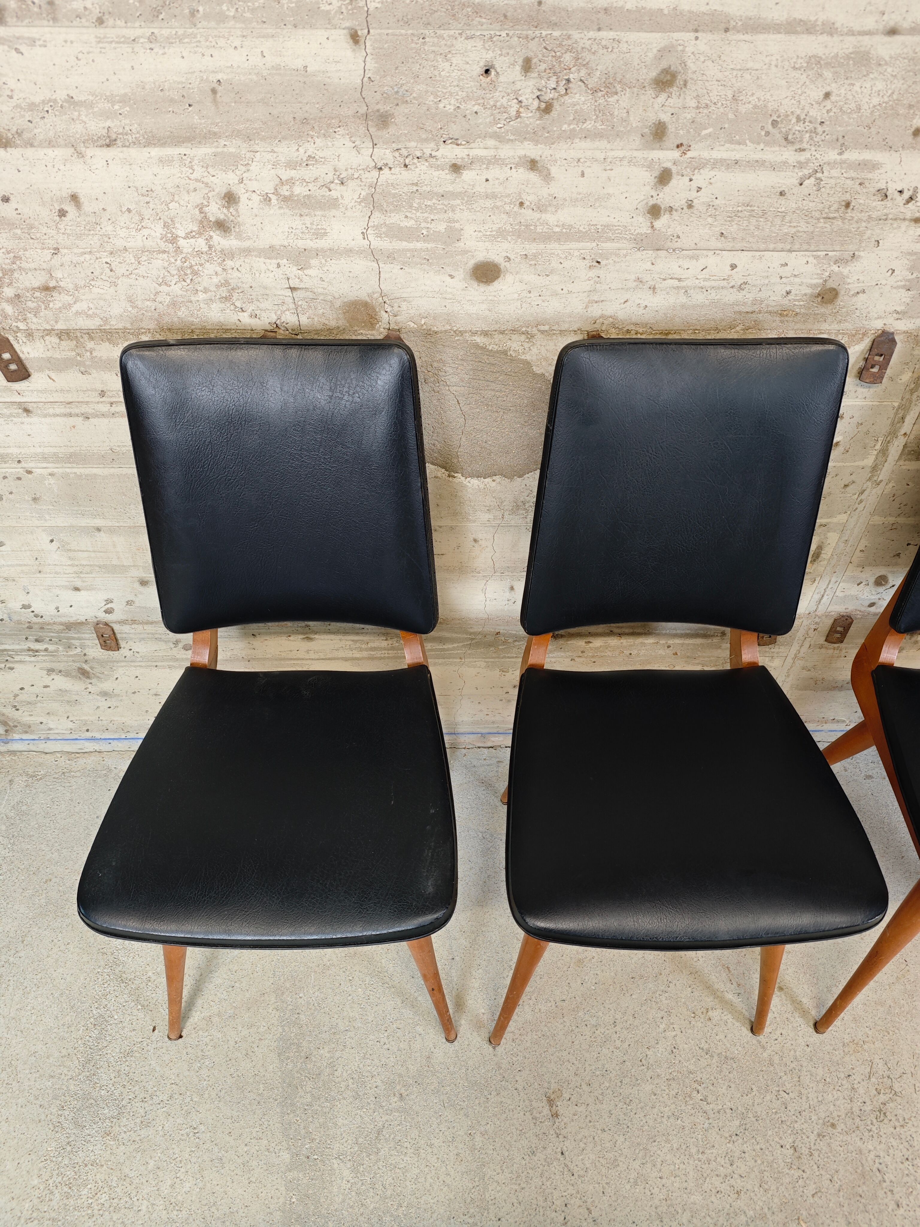 Set of 4 vintage chairs with tapered legs.