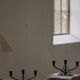 Early 20th century, pair of Danish Art Deco candlesticks in metal with three arms, 1930s.