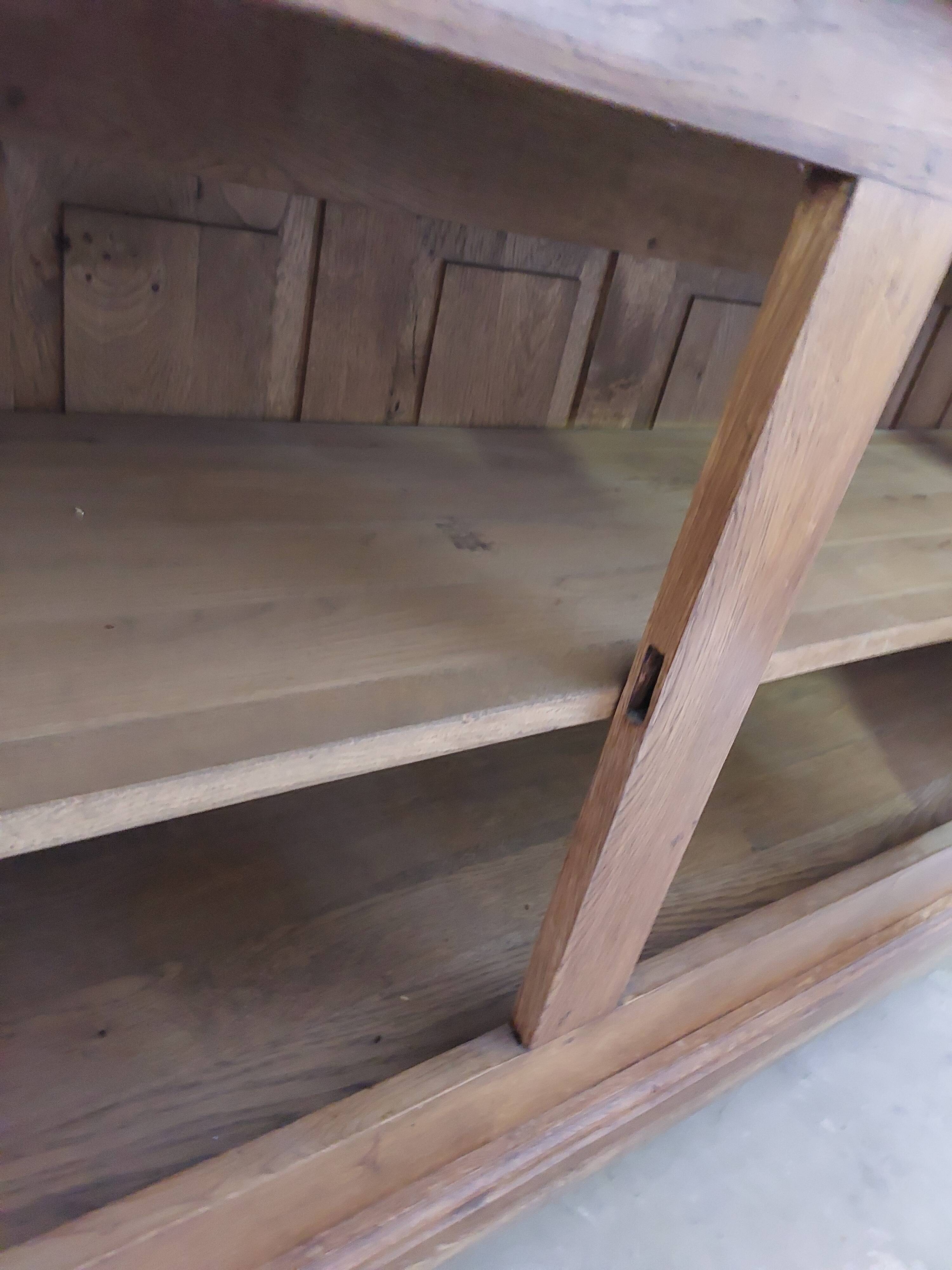 Showcase library with two sections in solid oak.