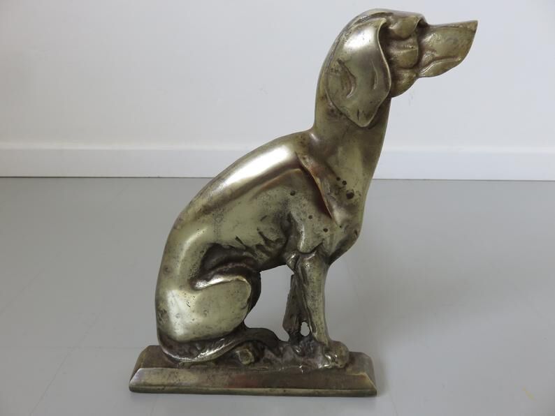 Pair of "dog" channels in solid bronze 30/40