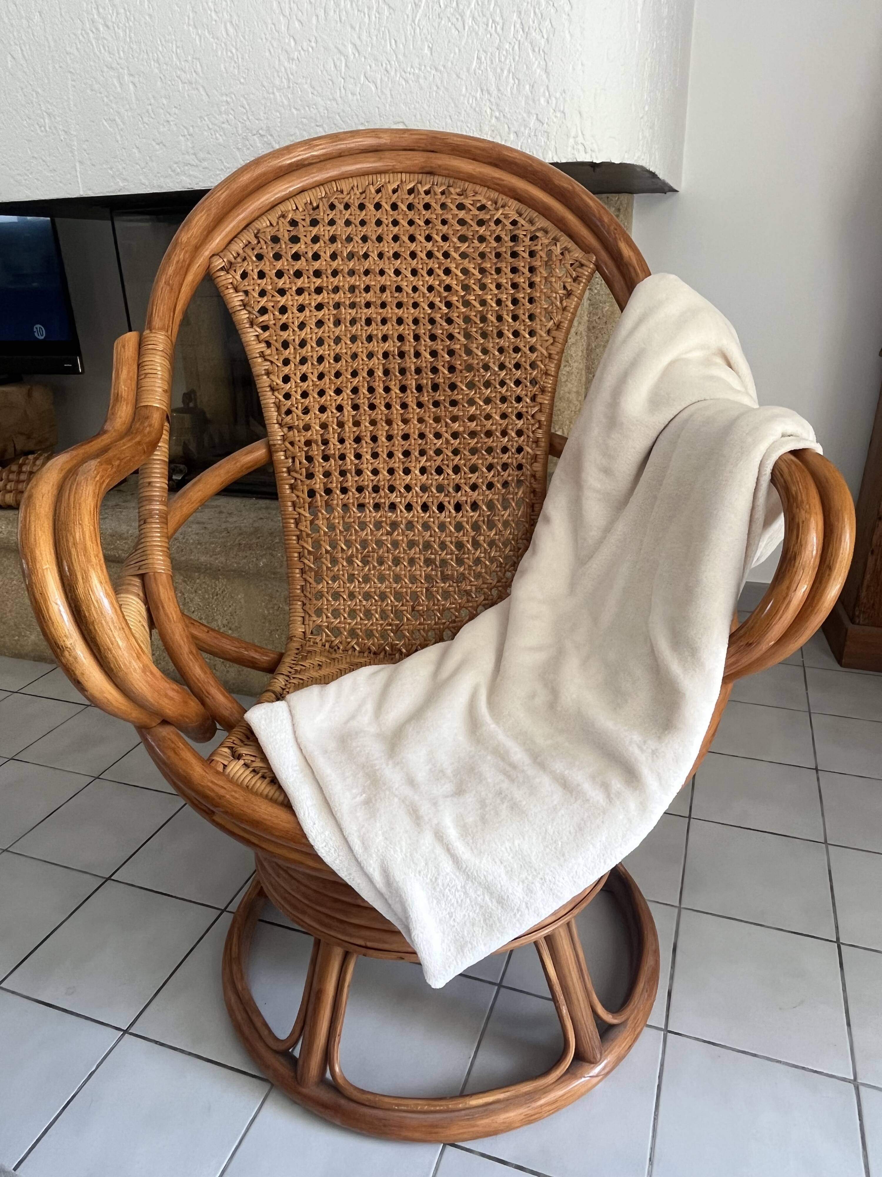 Vintage rattan and cane swivel armchair (1970s/80s) -
