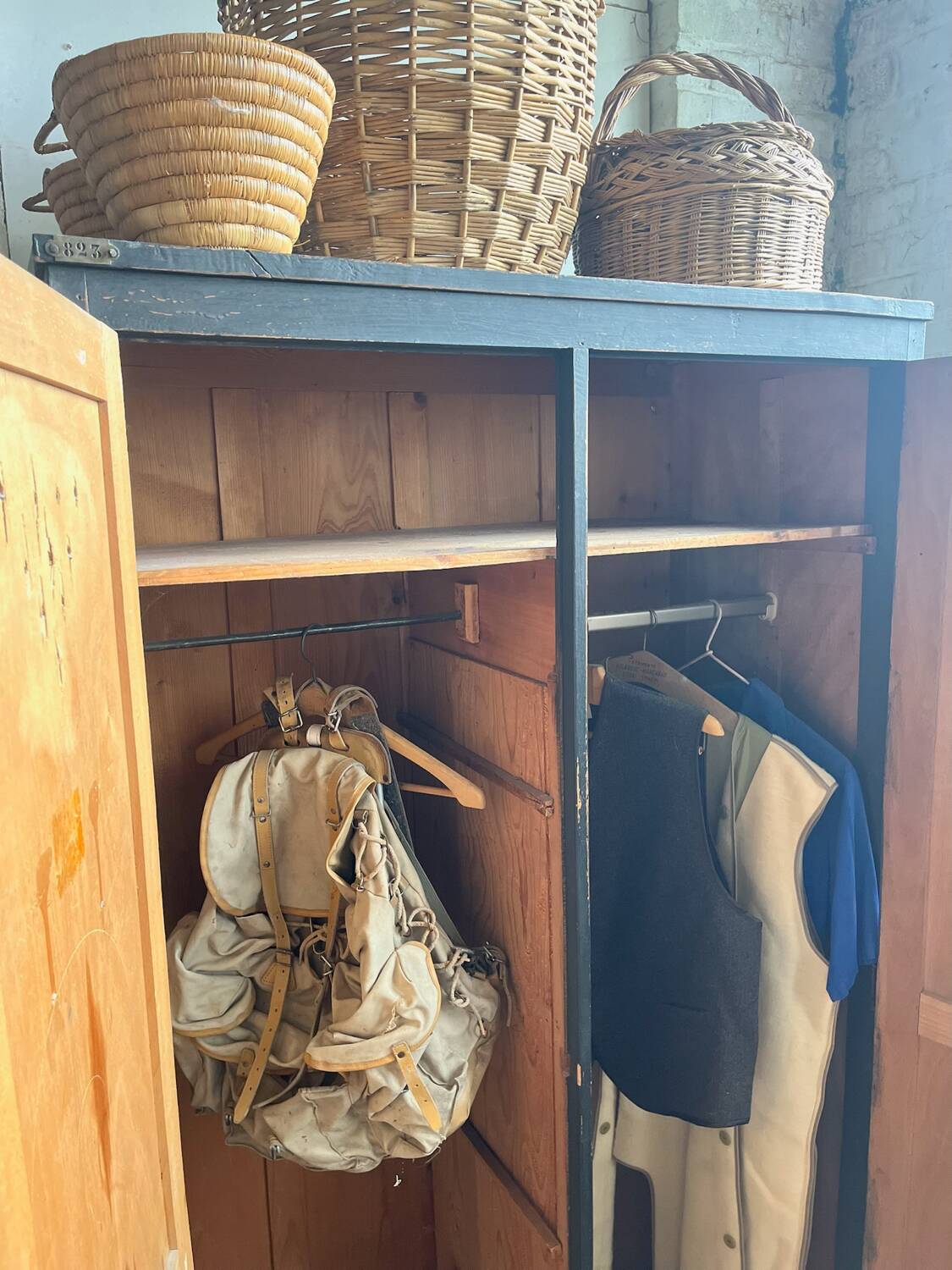 Old wooden locker with black patina