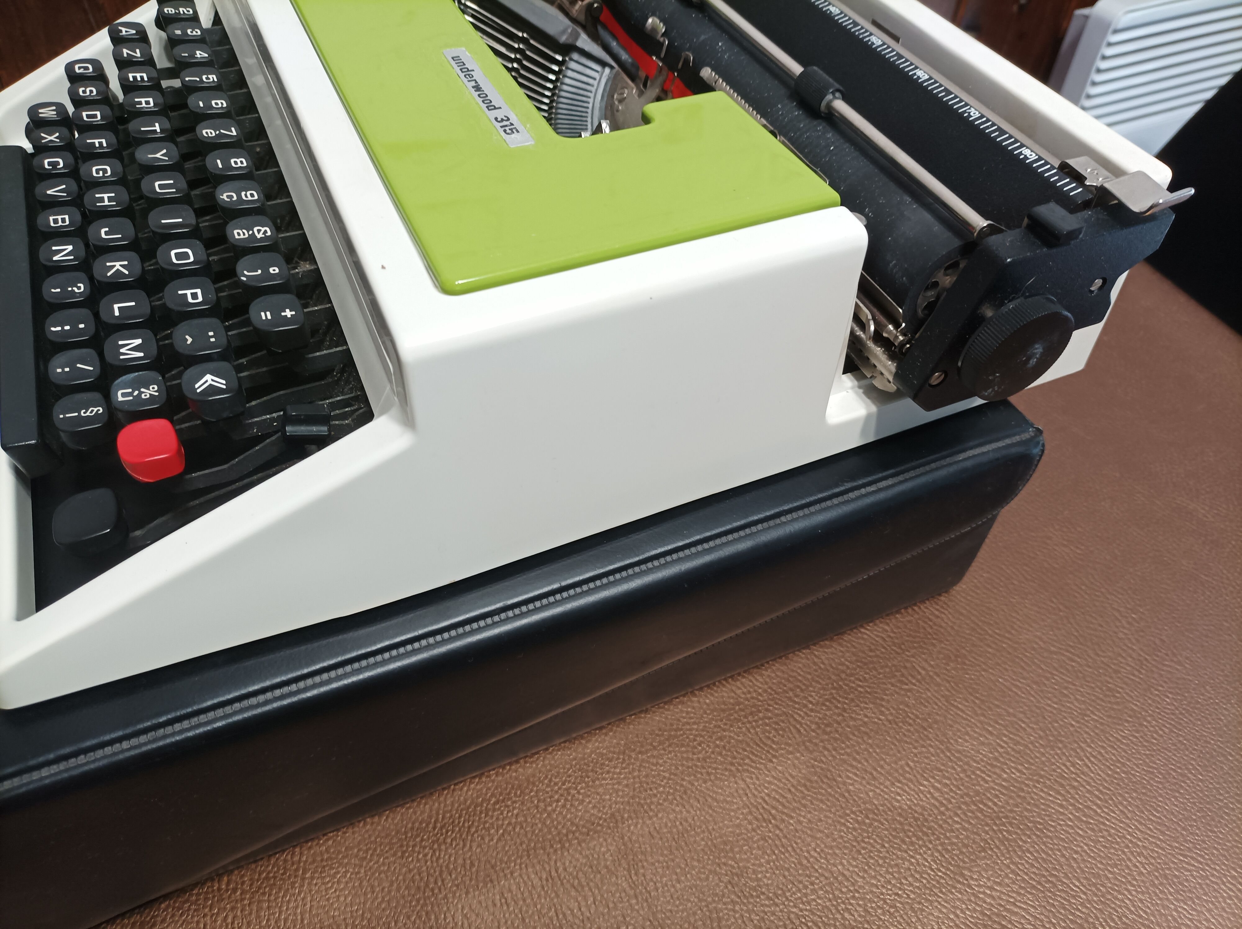 Green Underwood 315 typewriter with its briefcase