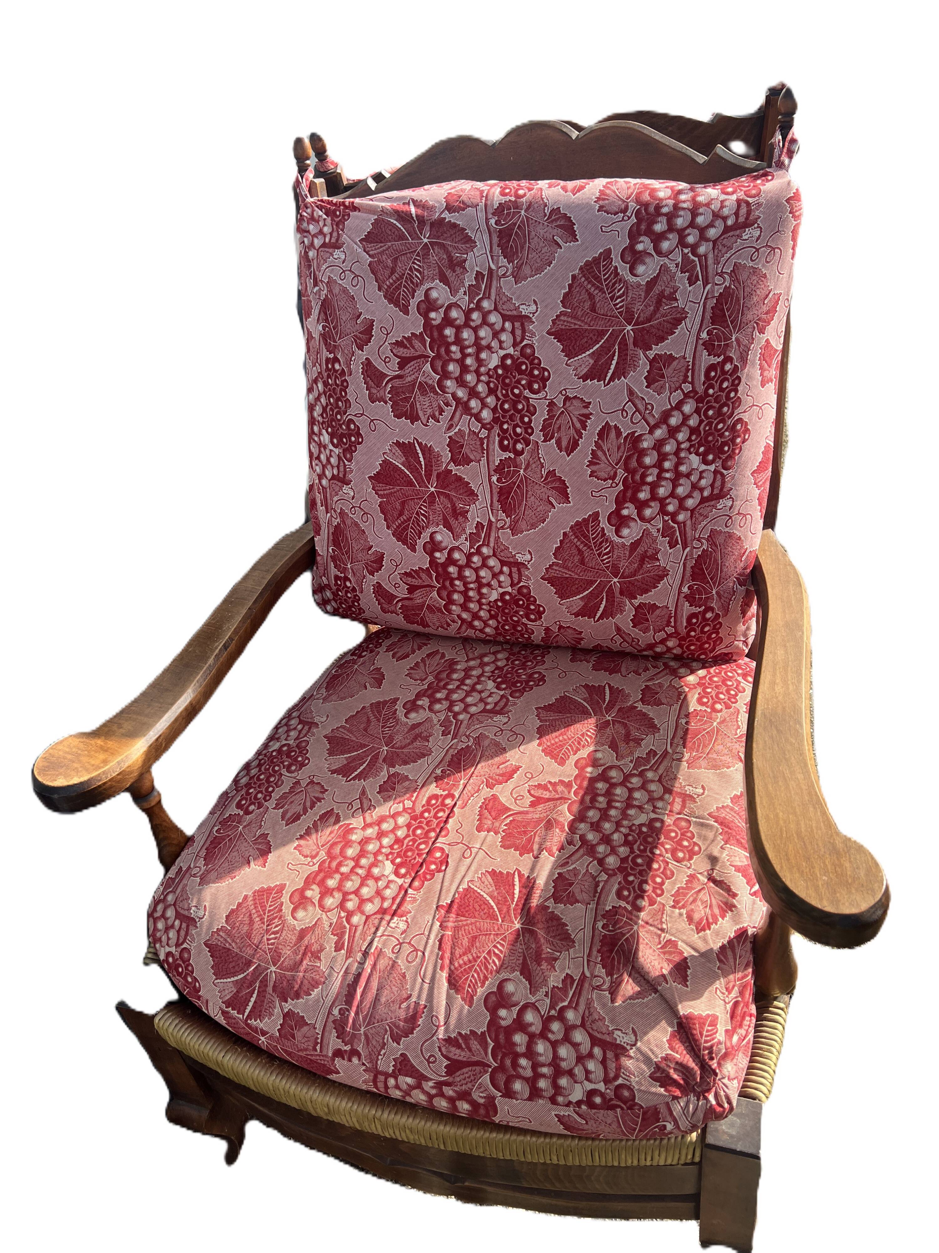 pair of rustic wood and fabric armchairs