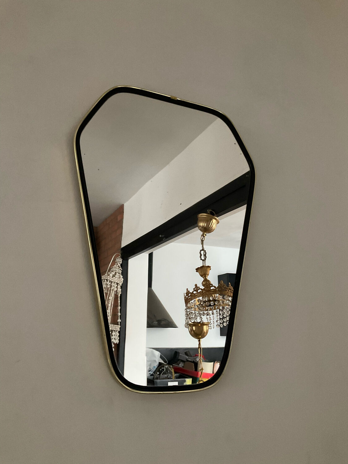 Asymmetrical free-form mirror from the 60s-70s
