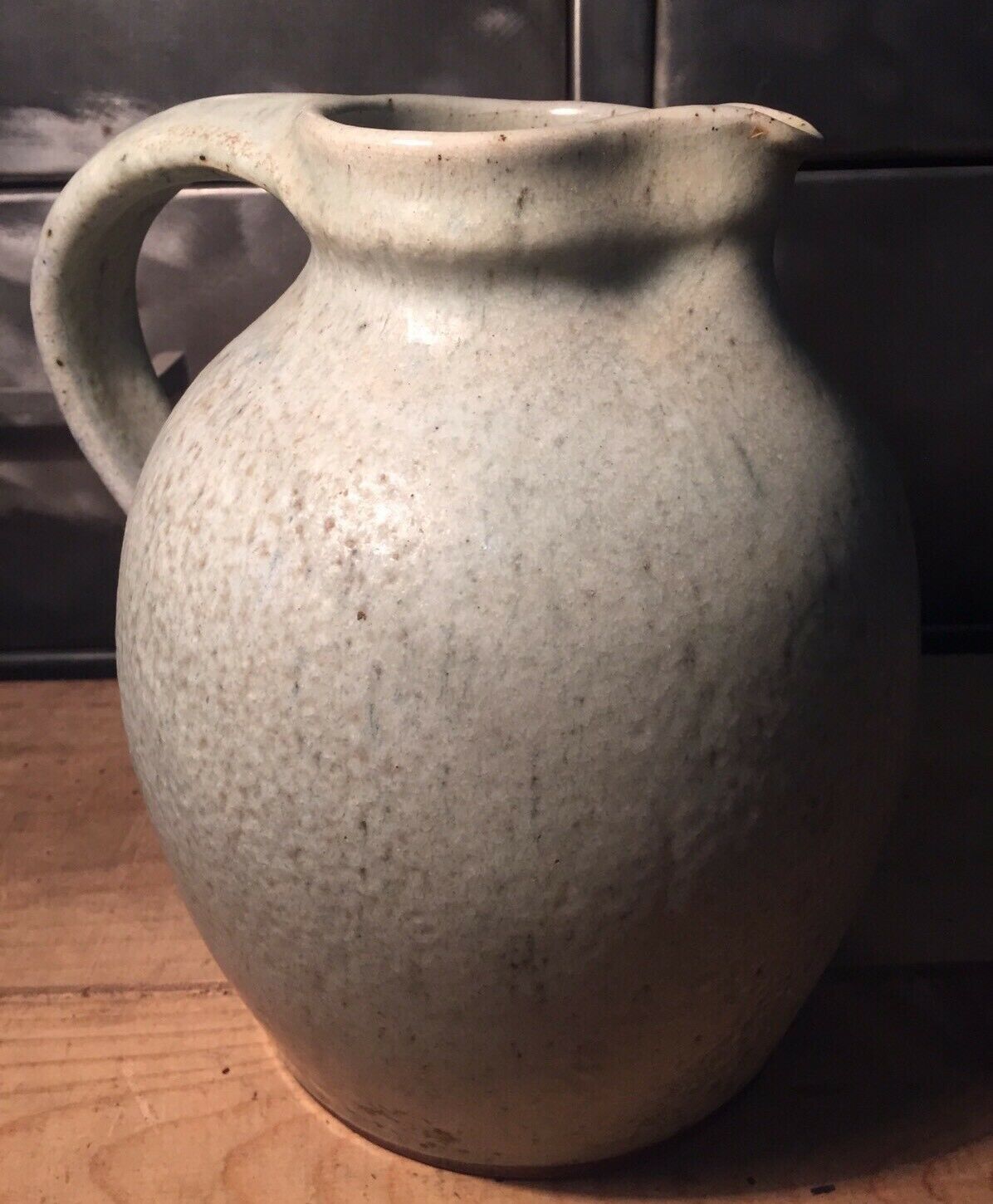 Pitcher in speckled gray enamelled sandstone signed