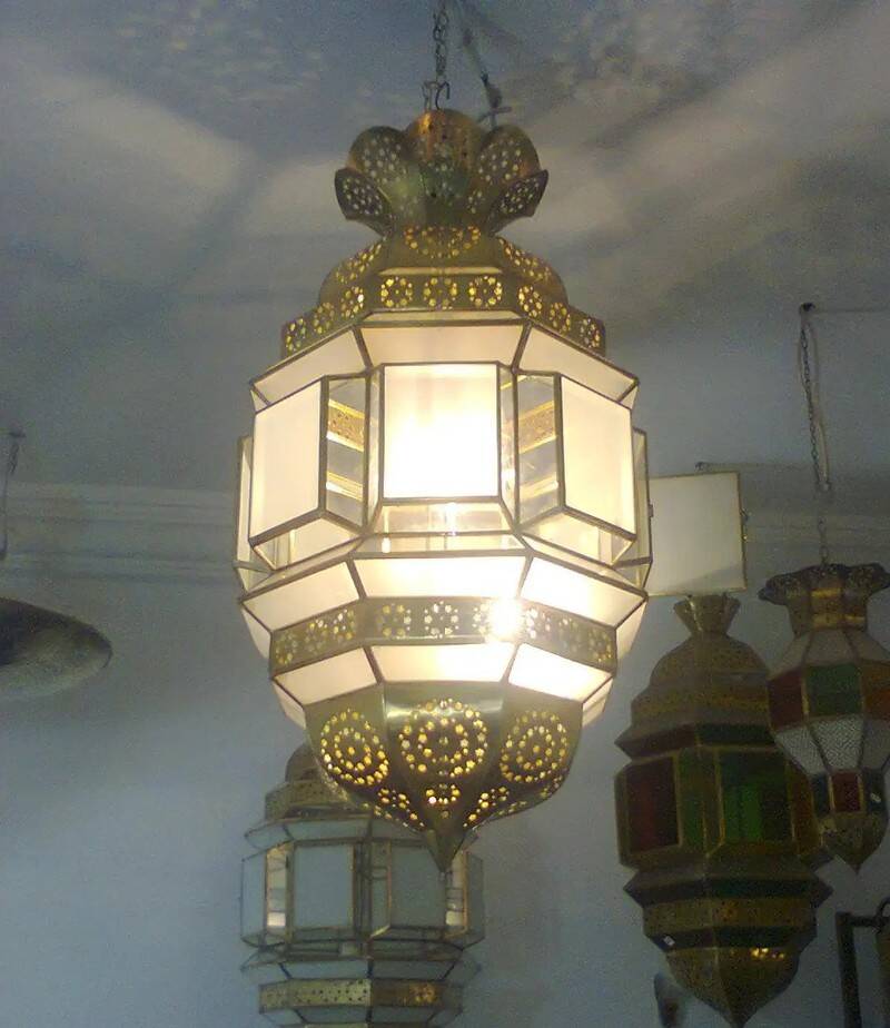 Traditional Moroccan hanging lantern in glass and metal.