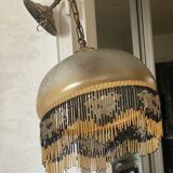 Glass lampshade and pearl tassels