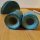 Trio of salt shakers, pepper shakers and napkin holders in green marble