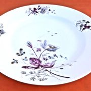 Antique white porcelain shallow dish with floral decoration.