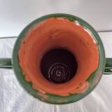 Handmade green ceramic amphora vase with large circular handles