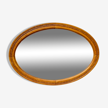 Miroir ovale vintage avec cadre en bois sculpté