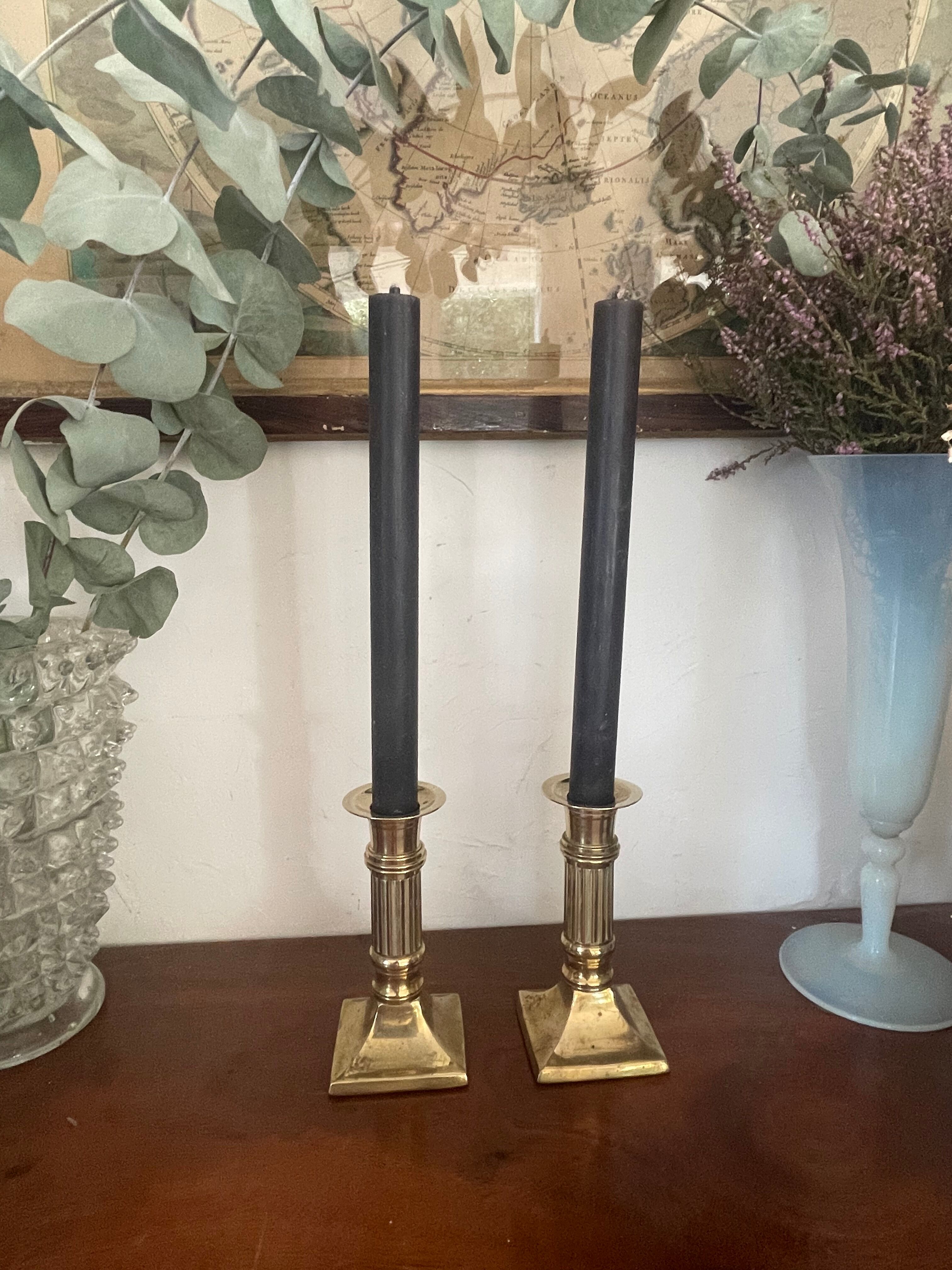 Pair of brass column candle holders