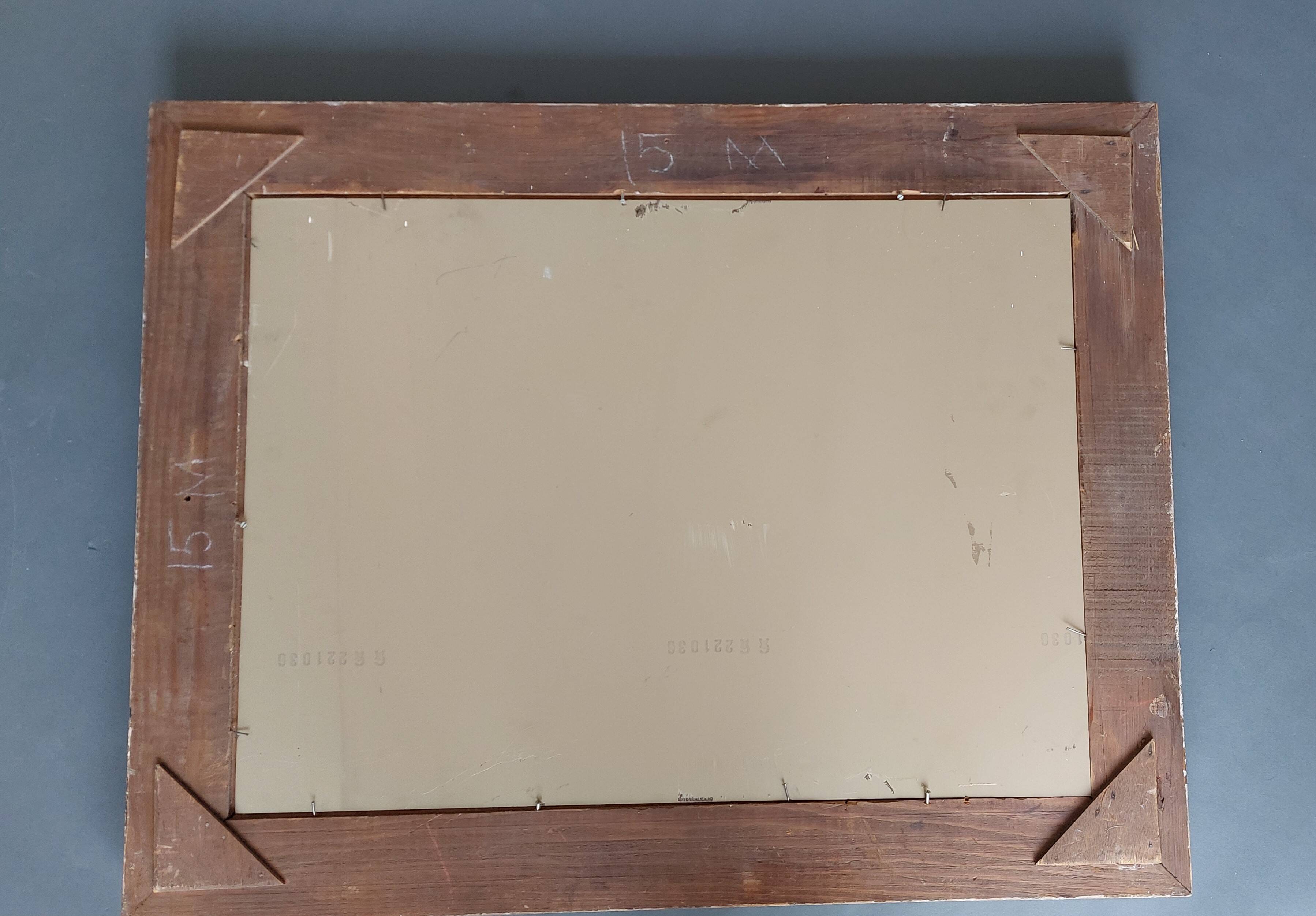 Large Montparnasse rocaille style frame in carved wood mounted in mirror.