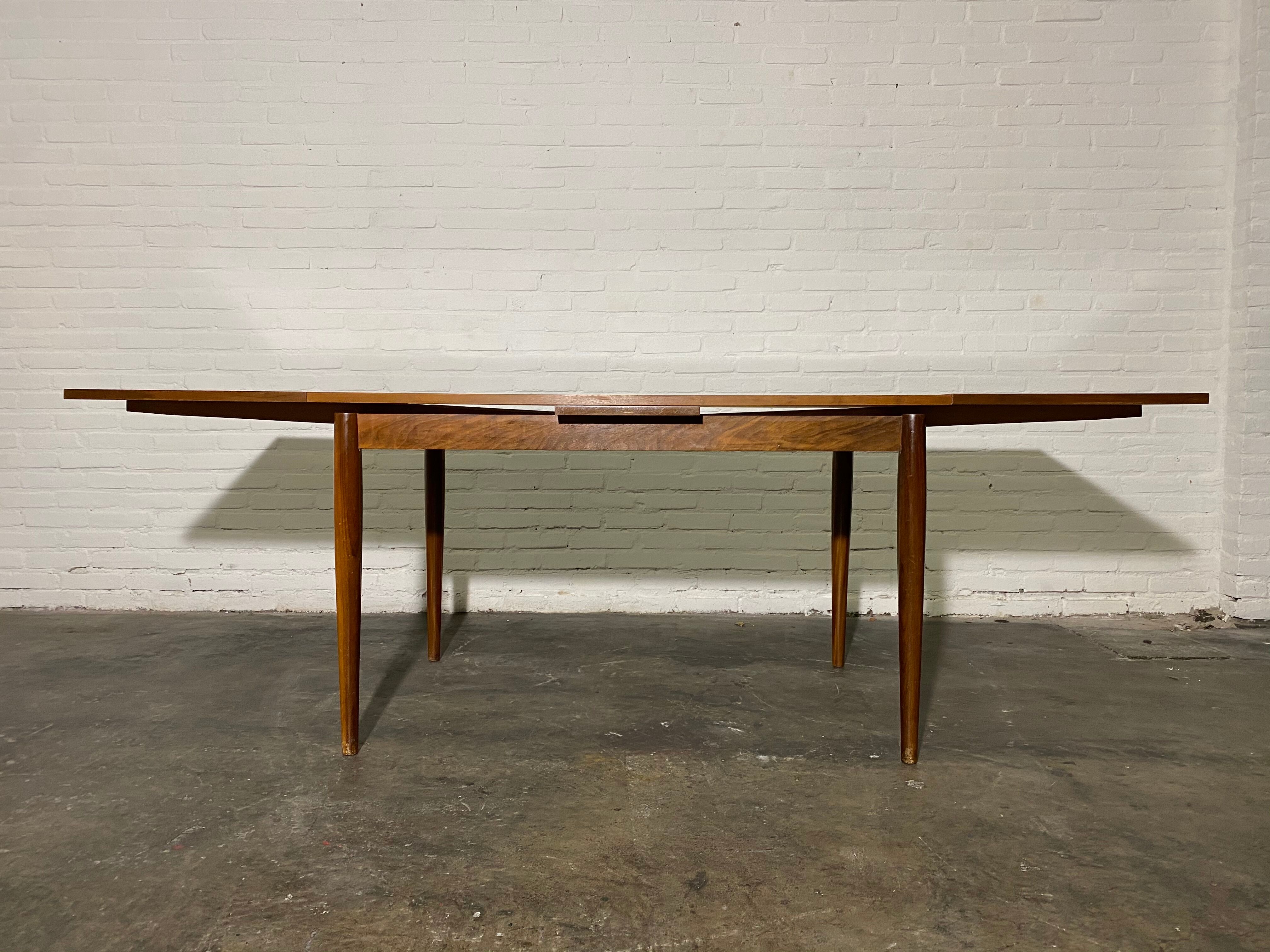 Vintage teak square extendable  dining table designed and manufactured by lübke,  1960s