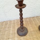 2 cast iron candlesticks