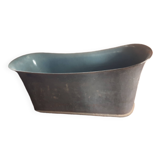 Aqua-colored cast iron bathtub