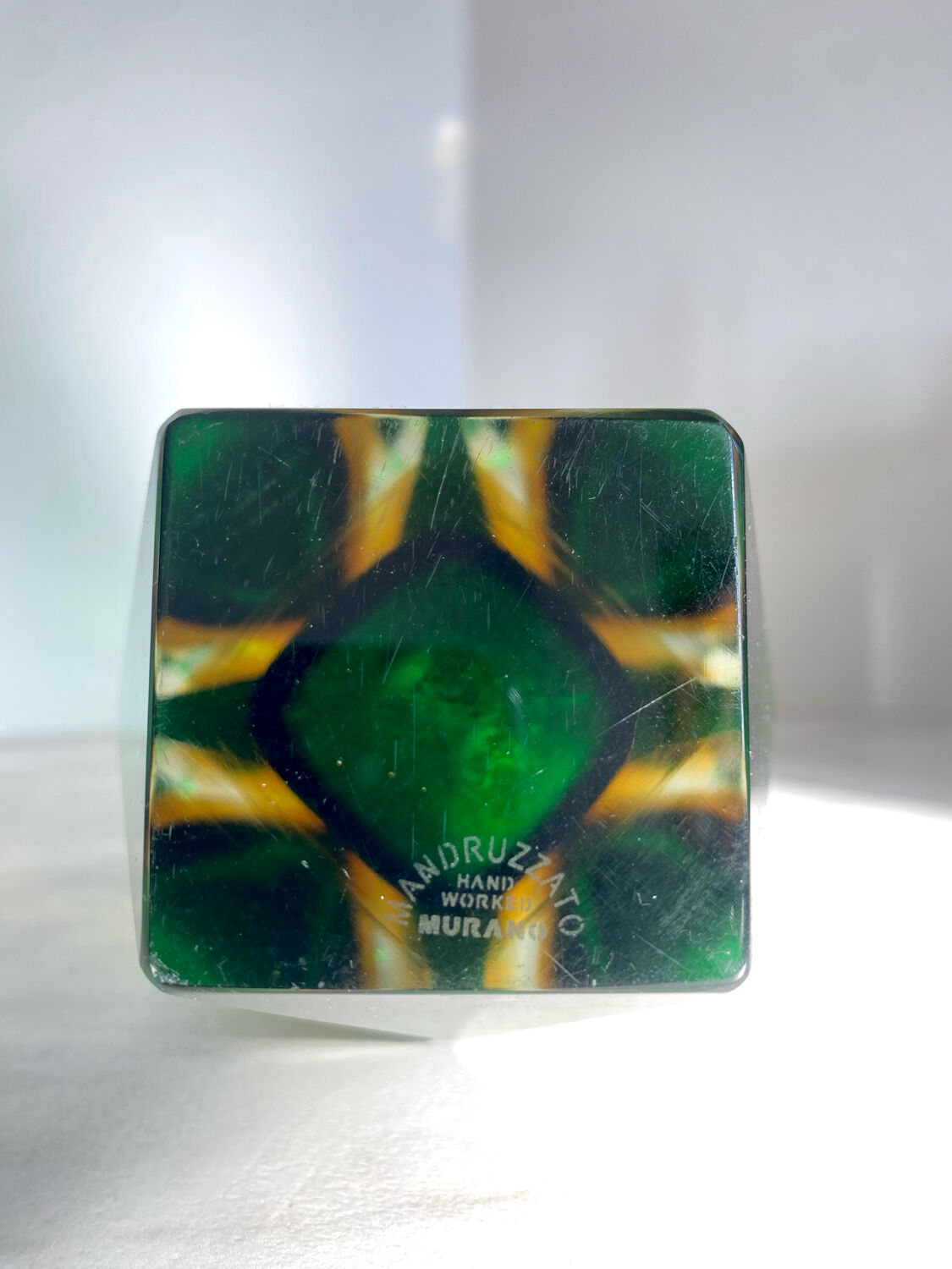 Submerged vase Mandruzzato Murano green and amber, sculpted faceted glass