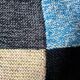 Hand knitted patchwork plaid