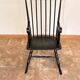 American rocking chair in its blackened patina.