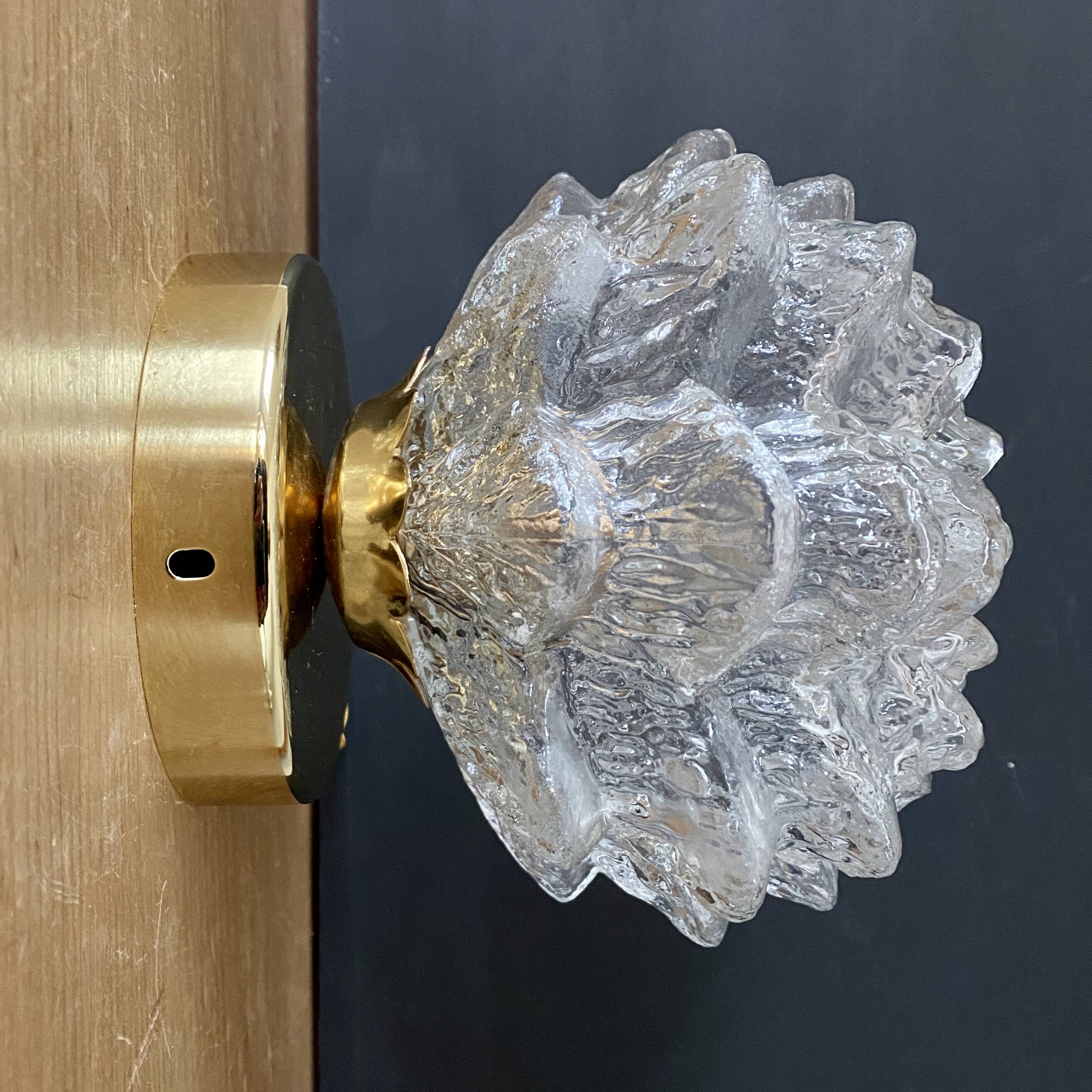 Vintage globe wall or ceiling light in molded glass in the shape of a flower