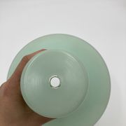 Green and gold saucer suspension