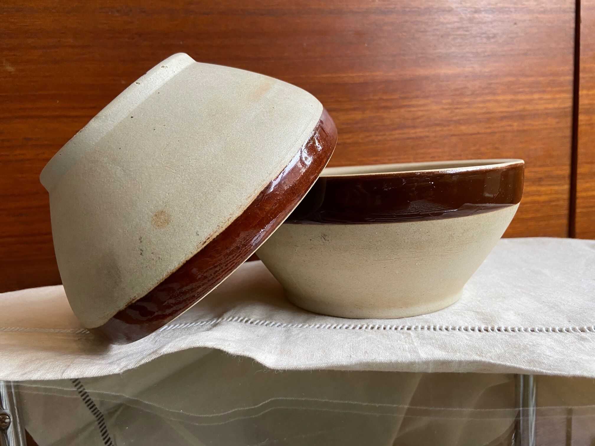 Pair of enamelled sandstone bowls