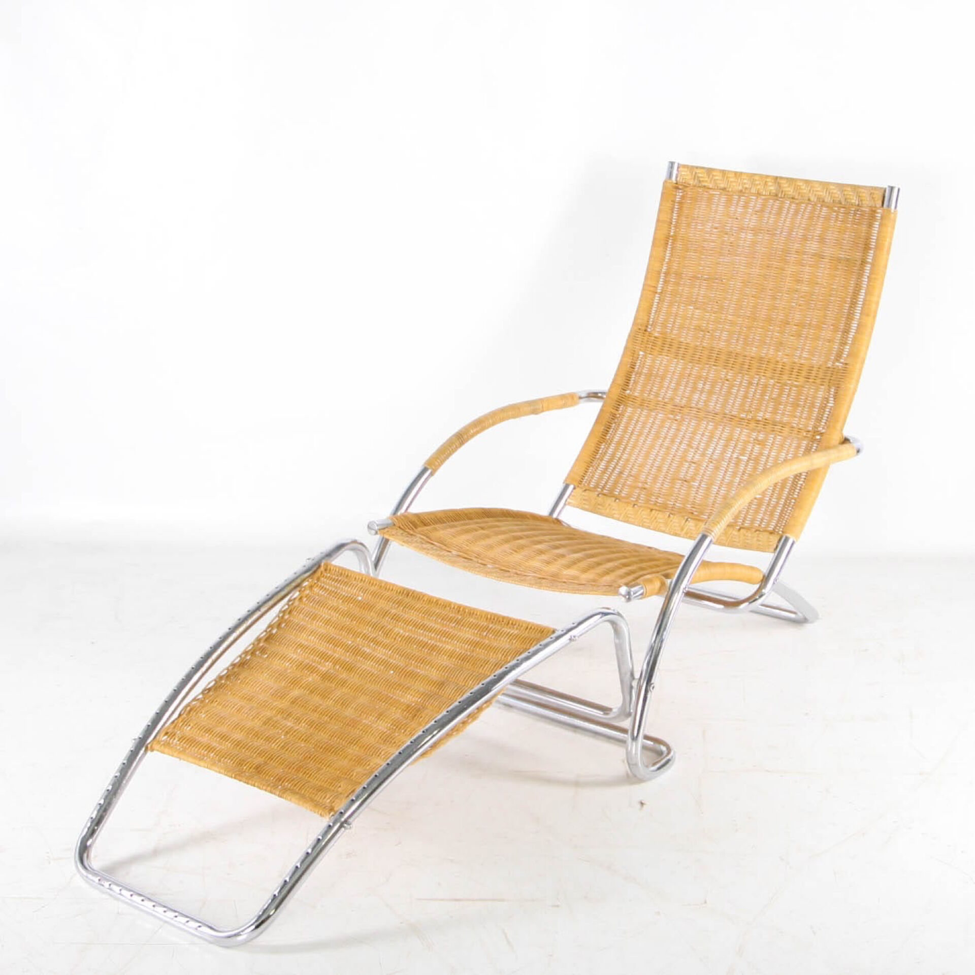 Wicker and chrome chaise longue