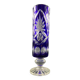 Tubular vase on a pedestal in cut blue Bohemian crystal.