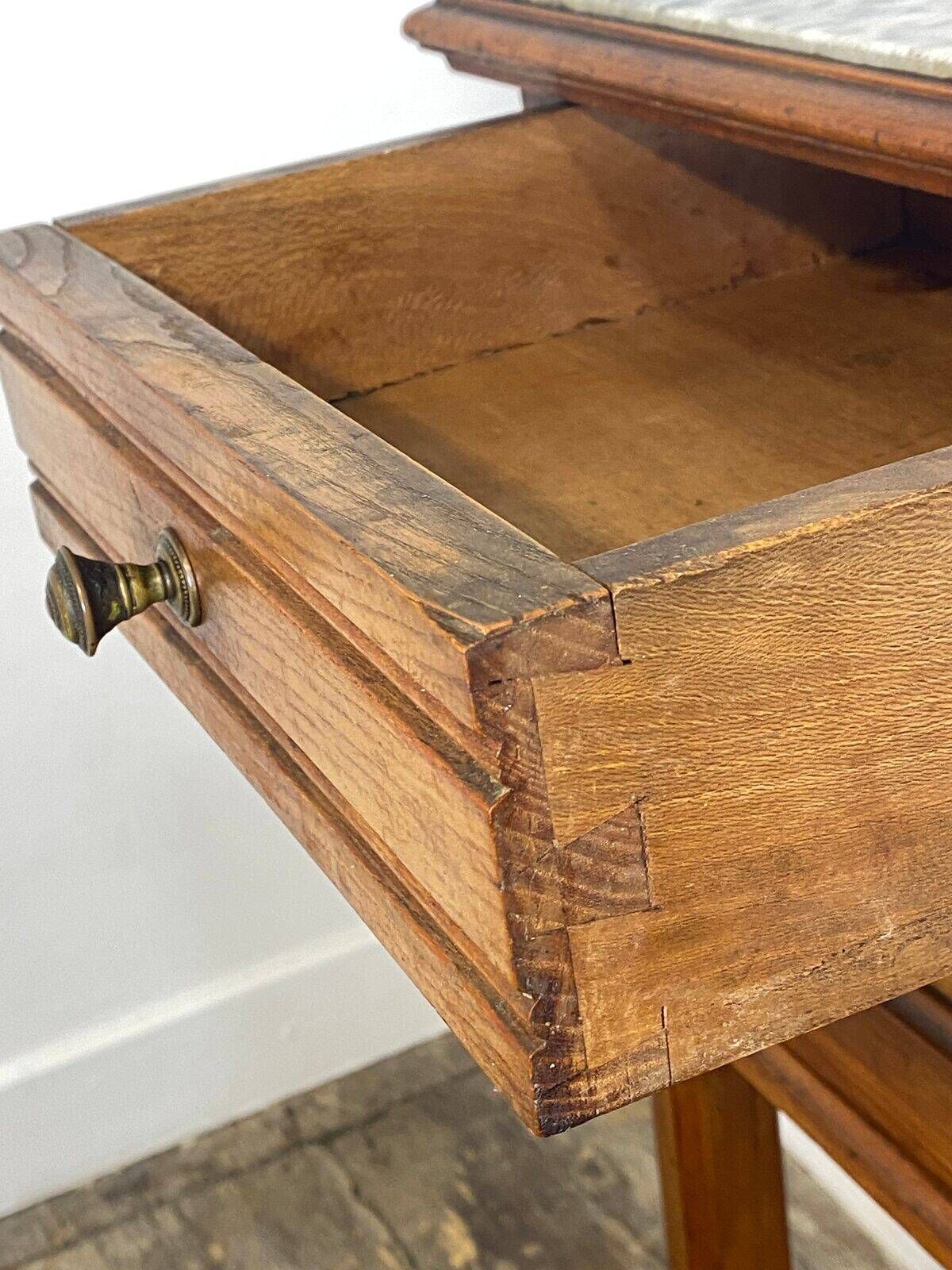 Provincial oak furniture, marble top, ceramic interior.