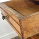 Provincial oak furniture, marble top, ceramic interior.