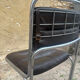 Four vintage chairs from the 1960s and 1970s, chrome with faux leather.