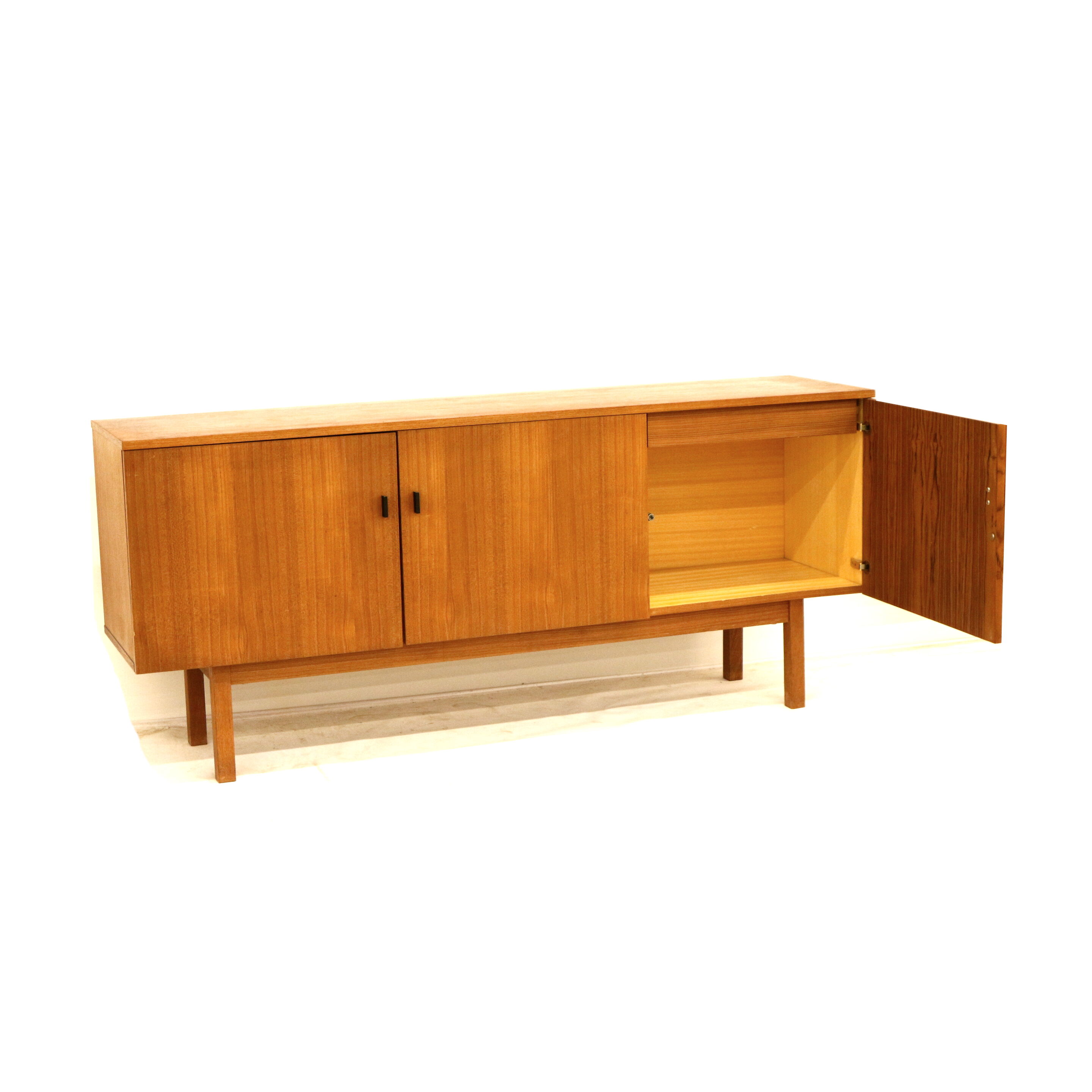 Vintage teak sideboard with doors and drawer made in the 1960s