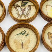 Vintage wooden coaster holder with 6 butterfly coasters.