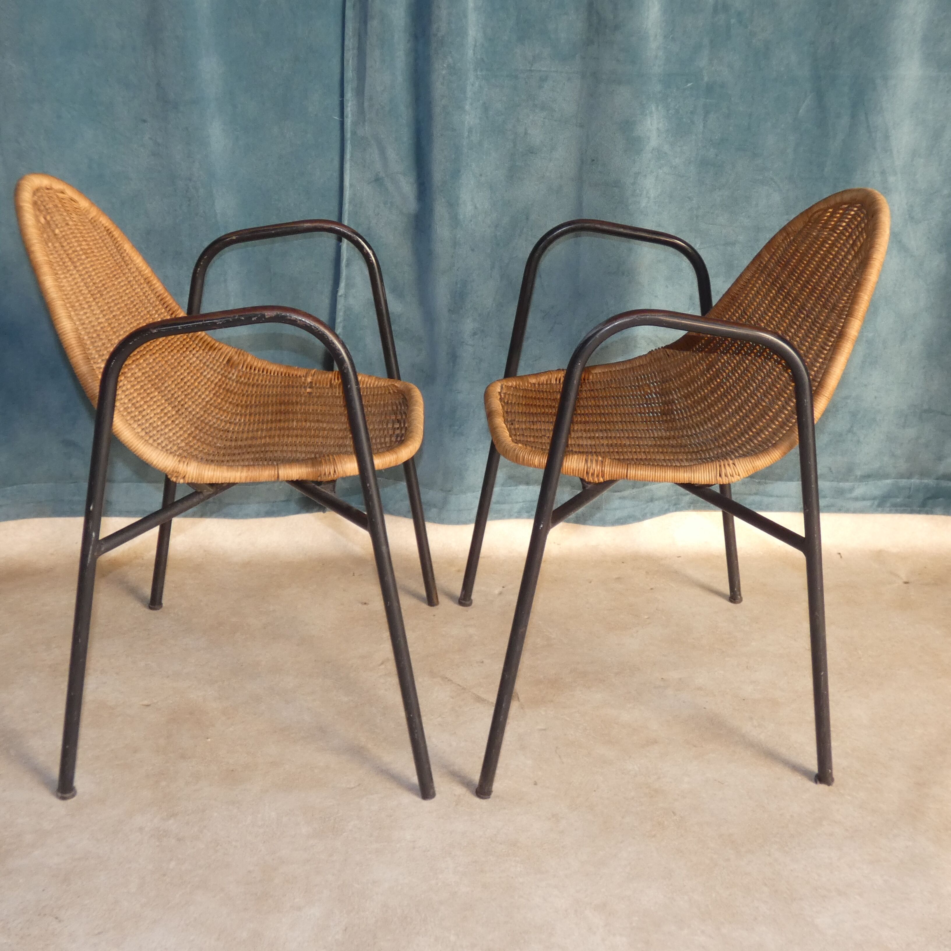 Pair of chairs / vintage armchairs in rattan and black lacquered metal